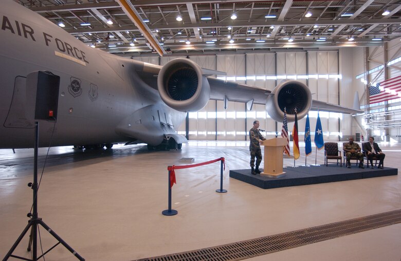 Brig. Gen. Rich Johnston, KMC and 86th Airlift Wing commander, speaks at the Oct. 26 opening of a C-5 maintenance hangar on Ramstein. The new facility was built to house the largest aircraft in the Air Force fleet. Photo by Senior Airman Megan Carrico