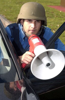 Kevin Thomas, investigator with the U.S. Army Garrison Kaiserslautern, tries to initiate on-scene negotiations with a hostage taker Oct. 27 during a role-playing exercise of the Federal Bureau of Investigation's Basic Crisis Negotiation Course on Kapaun Air Station. Photo by Christine June