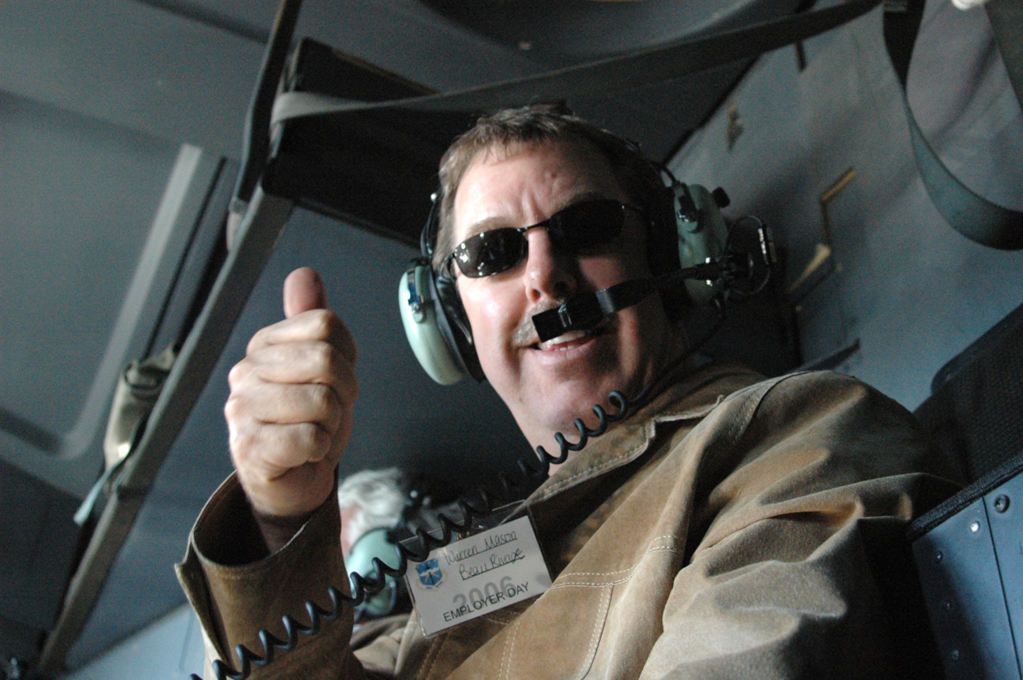 Warren Mason, from Beau Rivage Casino, gives the thumbs up during a flight with the 53rd Weather Reconnaissance Squadron, better known as the Hurricane Hunters. Employers were invited to fly along with the Air Force Reserve unit to learn more about what their Reservists do while on duty with the unit.