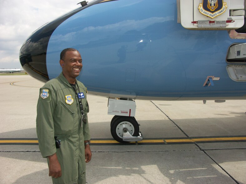 Tech. Sgt. Dave Brown waits at the nose of a C-9C before a flight.  He is a flight attendant with the 932nd Airlift Wing.  They continue hiring for more positions.  Call 618-229-7173 or 1-800-257-1212.