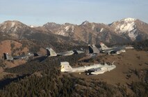 A five-ship formation flies over the Idaho Sawtooth Mountains Nov. 1. Col. Anthony Rock, 366th Fighter Wing commander, led the formation of two F-15E Strike Eagles, and F-15 Eagle, an F-16 Fighting Falcon, all from the 366th FW at Mountain Home Air Force Base, Idaho, and an EA-6B Prowler from the 388th Electronic Control Squadron at Naval Air Station Whidbey Island, Wash. The 366th FW began the first phase of its F-16 drawdown when five jets departed the base Nov. 2. The departure is part of the wing's realignment. (U.S. Air Force photo/Master Sgt. Kevin J. Gruenwald) 