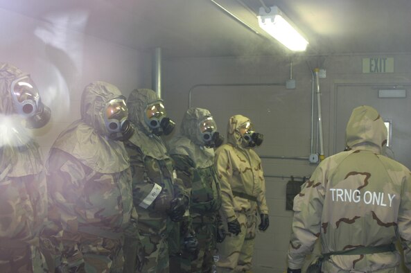 WRIGHT-PATTERSON AFB, Ohio -- Air Force reservists from the 445th Airlift Wing get exposed to gases inside the mask confidence training facility.  Chemical warfare training is required for most reservists assigned to the wing. (U.S. Air Force photo/Tech. Sgt. Charlie Miller).