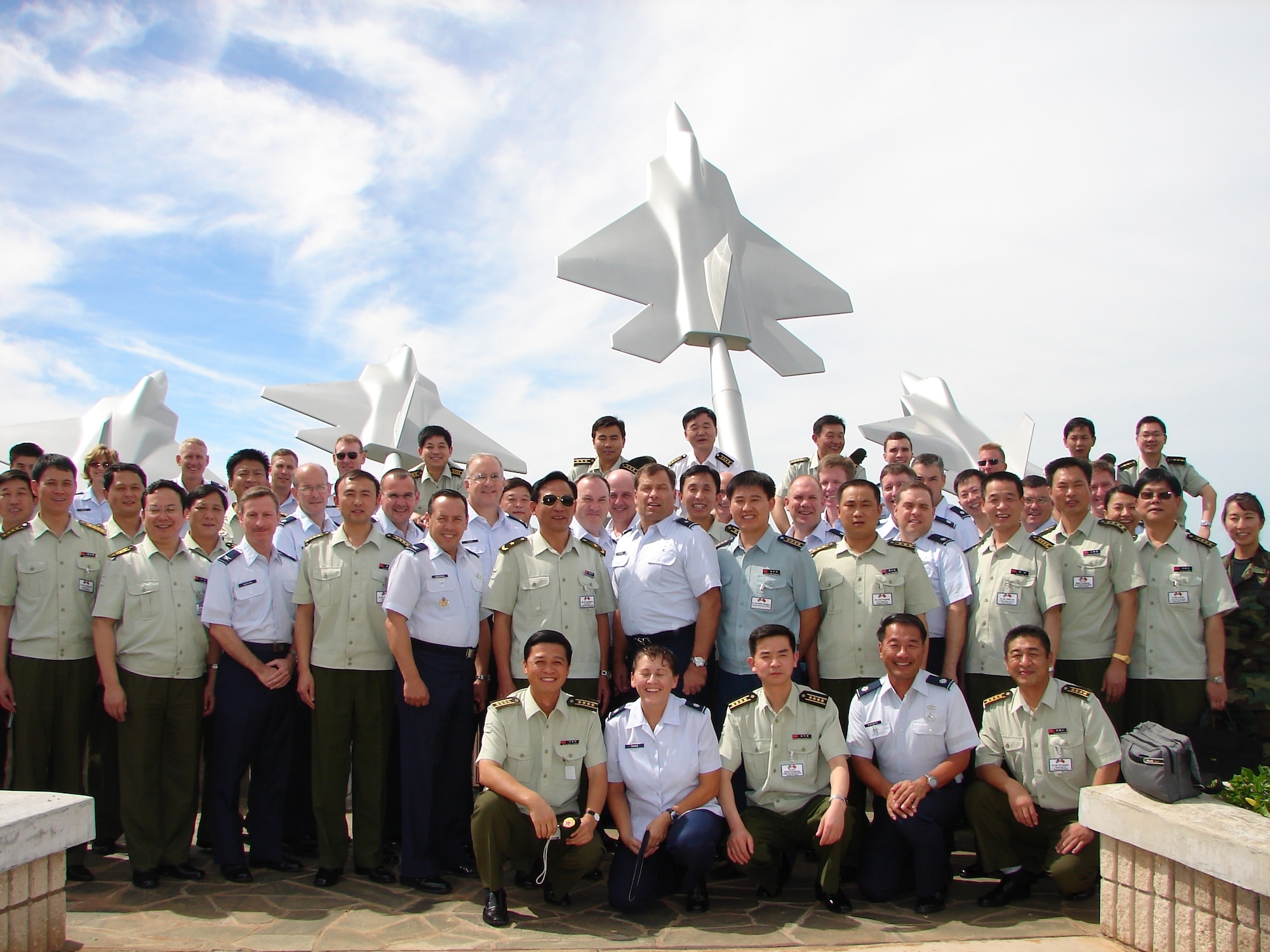 Pacific Air Forces Airmen hosted a delegation of 30 mid-grade commanders and a major general from China’s People’s Liberation Army to further understand each others mission, training capabilities and infrastructure.  Hickam was the last stop during a week-long visit to military installations in California and Hawaii. (U.S. Air Force photo by Lt. Col. Tracey J. Saiki) 