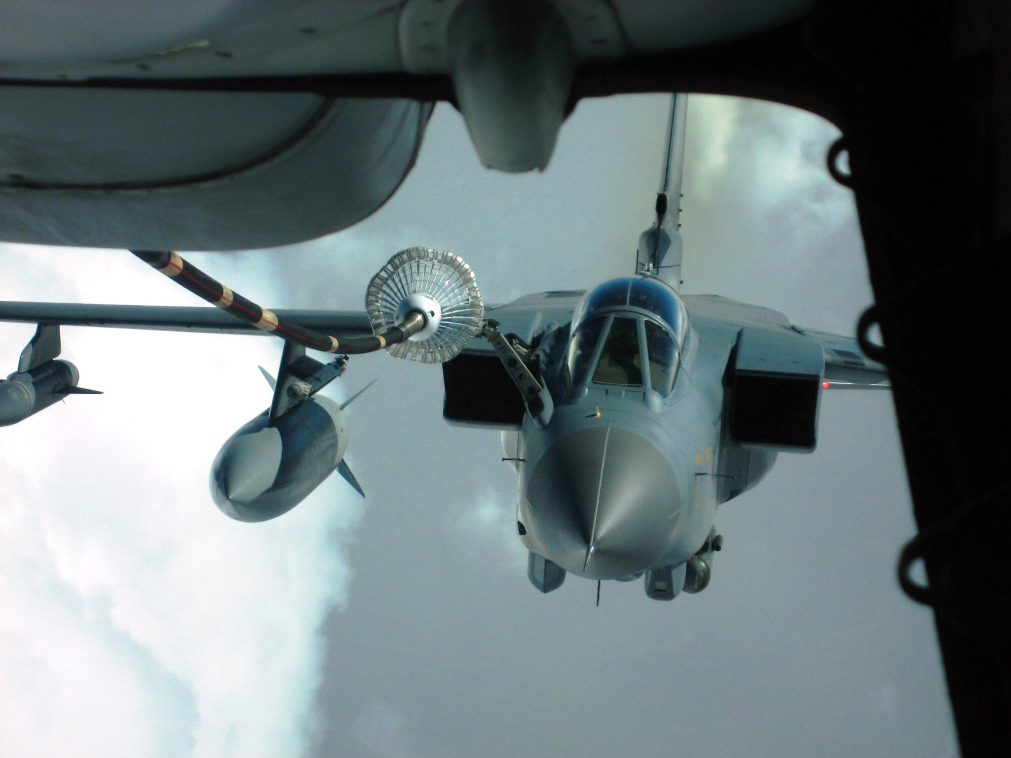 A Royal Air Force Tornado bomber/fighter aircraft prepares to connect with the trailing drogue of a KC-10 Extender over Iraq Nov. 5. The KC-10 is assigned to the 380th Air Expeditionary Wing, the largest air refueling unit in Southwest Asia, using KC-10s and KC-135 Stratotankers to fuel U.S. and allied aircraft. (U.S. Air Force photo/Capt. Justin T. Watson)