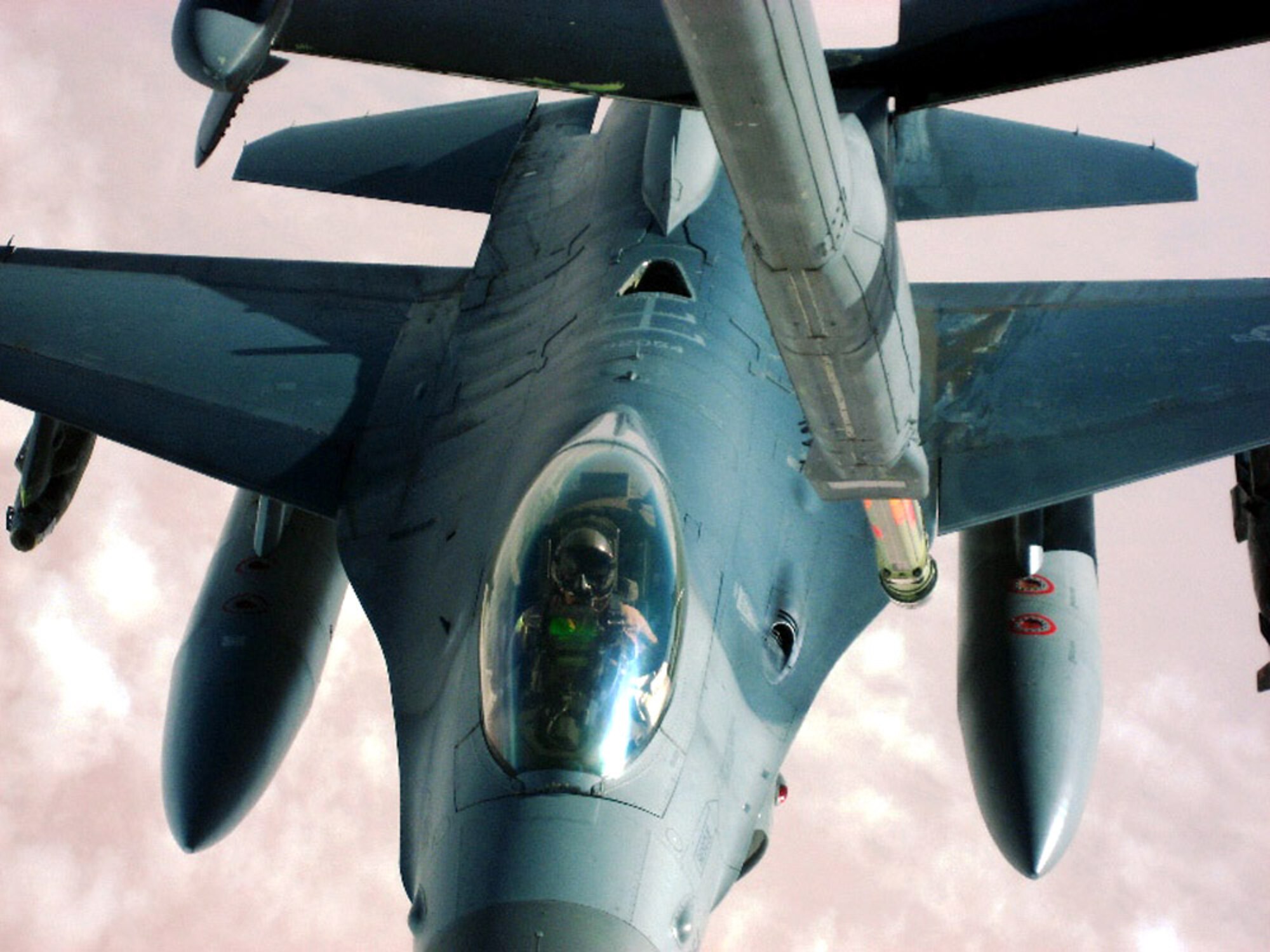An F-16 Fighting Falcon from the New York Air National Guard takes fuel from a KC-10 Extender from the 380th Air Expeditionary Wing over Iraq Nov. 4. The 380th AEW is the largest air refueling unit in Southwest Asia, using KC-10s and KC-135 Stratotankers to fuel U.S. and allied aircraft. (U.S. Air Force photo/Capt. Justin T. Watson)
