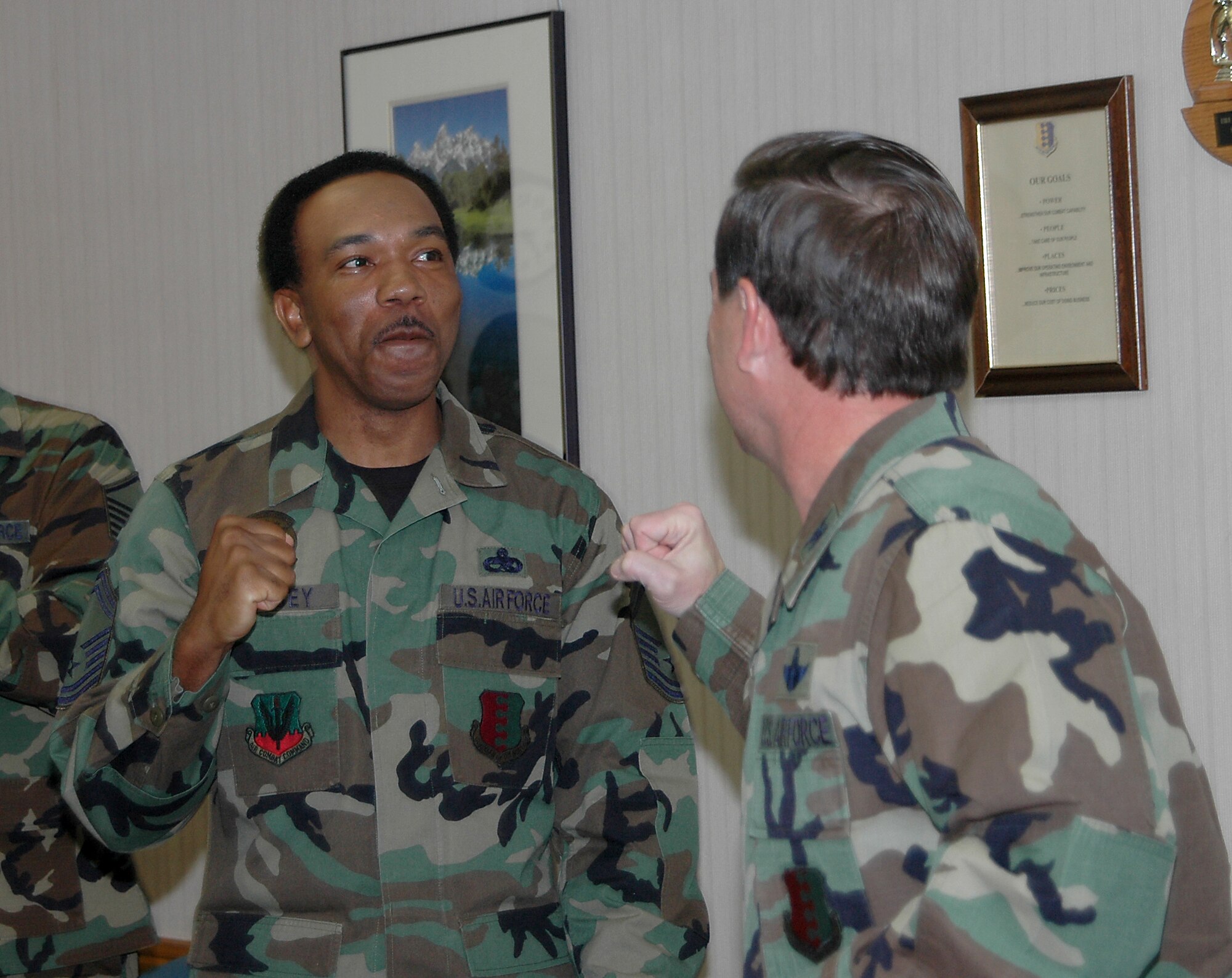 28th Bomb Wing leadership congratulates, Senior Master Sgt. Jeffery Lindsey, 28th Maintenance Squadron, one of the newest chiefs as announced Nov. 8. More than 30 members of the wing leadership loaded up a bus and traveled to all four selectees' offices to congratulate them.