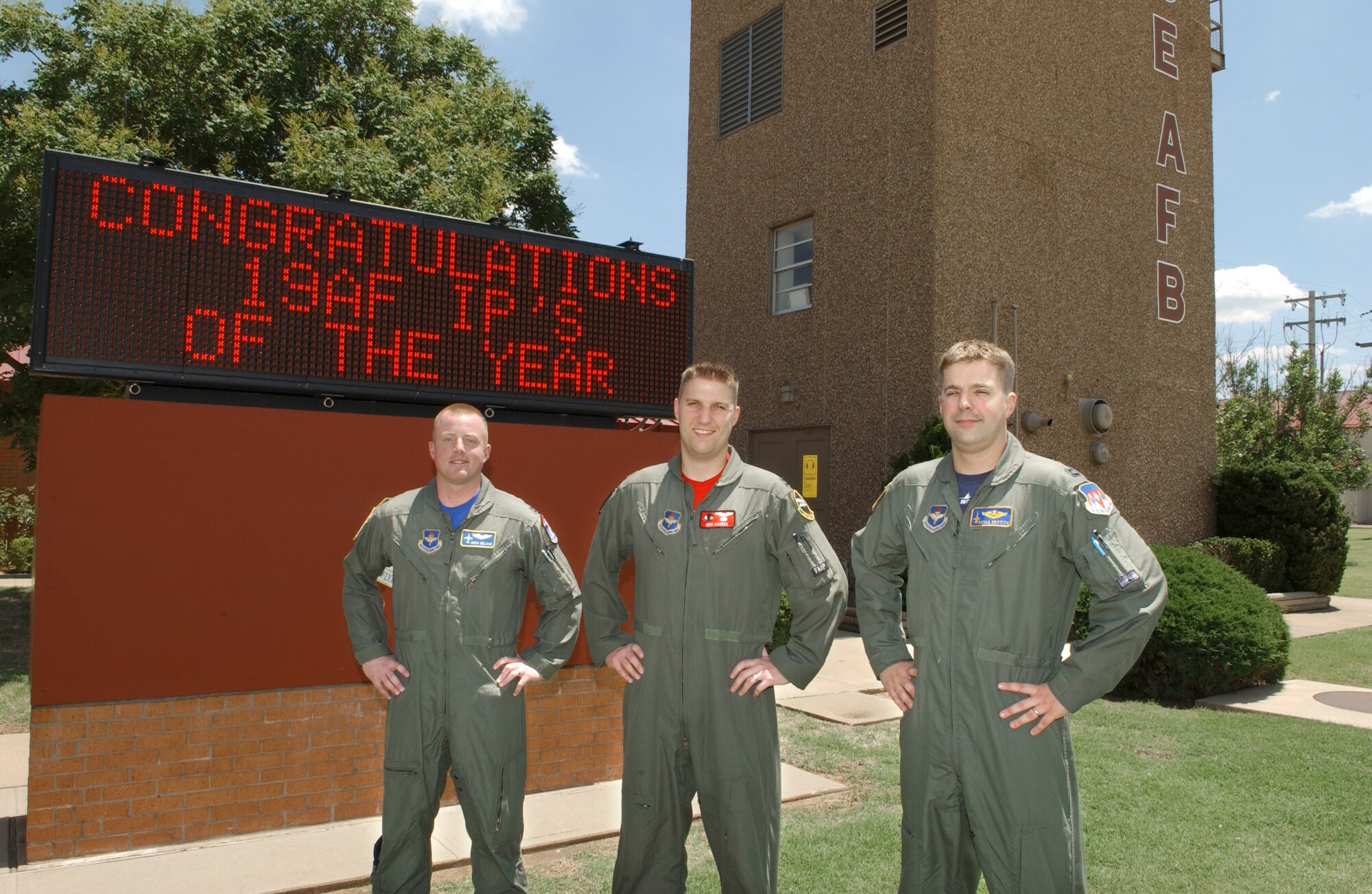 Capts. Greg Nelson, 32nd M Flight class commander, Richard Ganske, 8th Flying Training Squadron C Flight commander, and Bryan Griffith, 25th Check Flight commander, each earned their respective airframe’s Instructor Pilot of the Year award for 19th Air Force.(Photo by Terry Wasson)