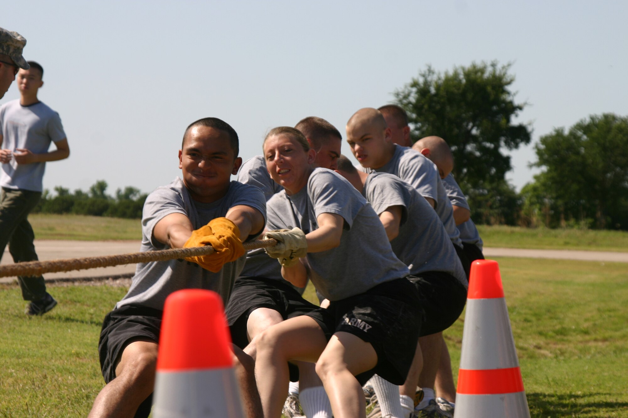Sergio Franco, along with members of the Army Joint Warrior Competition team, take part in the tug-of-war event Saturday. The Army team went to the final round in the event, beating out the the 363rd Training Squadron to get there. In the final round the Army team fought hard, but the 383rd TRS won in the tug-of-war and took the trophy home for the Joint Warrior Competition.  (U.S. Air Force photo/Airman Jacob Corbin).