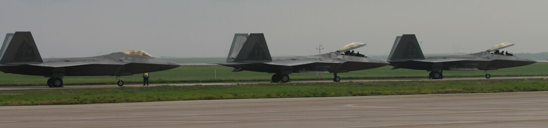 Three Air Education and Training Command F-22 Raptors from Tyndall Air Force Base, Fla., made a quick stop to fuel up Sunday during a cross-country trip. It marked the first stop here for the Air Force’s newest jet fighter.  (U.S. Air Force photo/1st Lt. Ian Phillips)