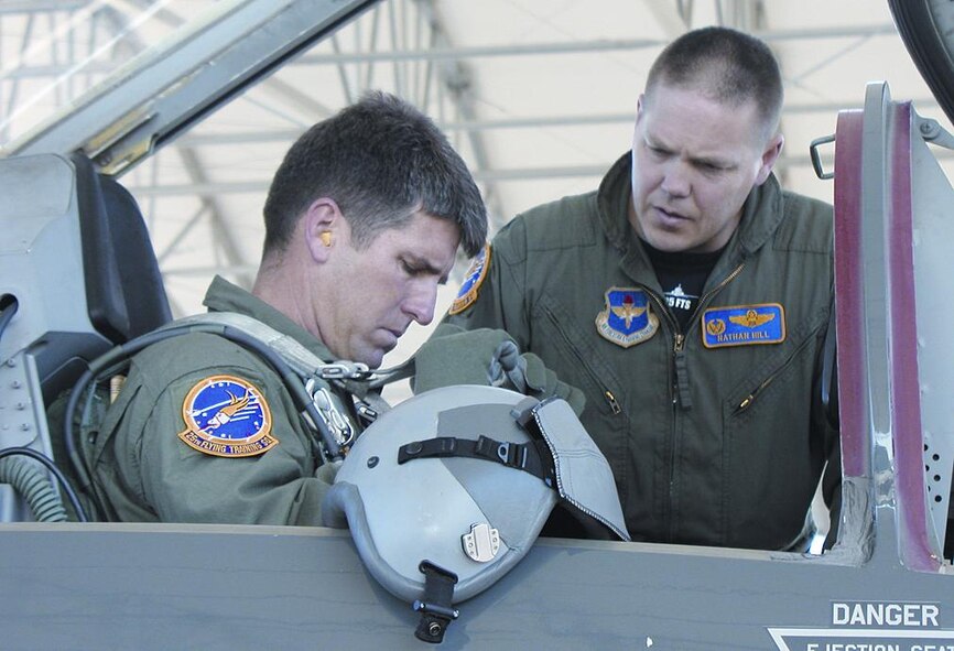 Colonel Hill prepares his "honorary commander," Brian Henson of Henson Construction, to take an orientation flight in a T-38C Talon aircraft May 19.  Part of the squadron commander's responsibility is maintaining and facilitating off-base community relations contacts.  One way to do that is to have an honorary commander and orientate him or her to the mission of the unit, the wing and the Air Force.(Photo by Capt Tony Wickman)