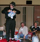 “Pit Boss” Bruce Jackson, Air Force Association board member, reads a name for a prize as Richard Johndrow and George Pankonin, Enlisted Appreciation Night co-chairs, await the announcement. More than 270 Vance enlisted members attended the annual event Saturday.(Courtesy Photo by Connie Johndrow)