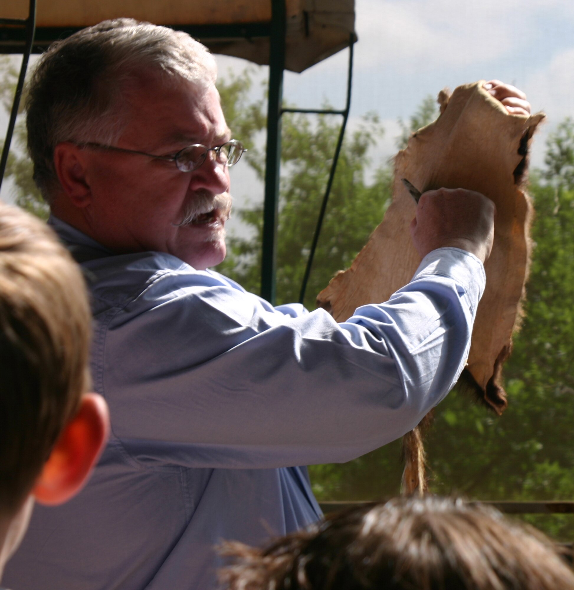 Students from area elementary schools got in touch with “Mother Nature” Wednesday during the Riverbend Nature Works annual Earth Day Celebration at the organization’s facility near Lucy Park in Wichita Falls. Tim Hunter, of the 82nd Civil Engineer Squadron’s Environmental Flight, also made his annual appearance at the event to share a little about the “critters” that roam the North Texas countryside. (U.S. Air Force photo/John Ingle).