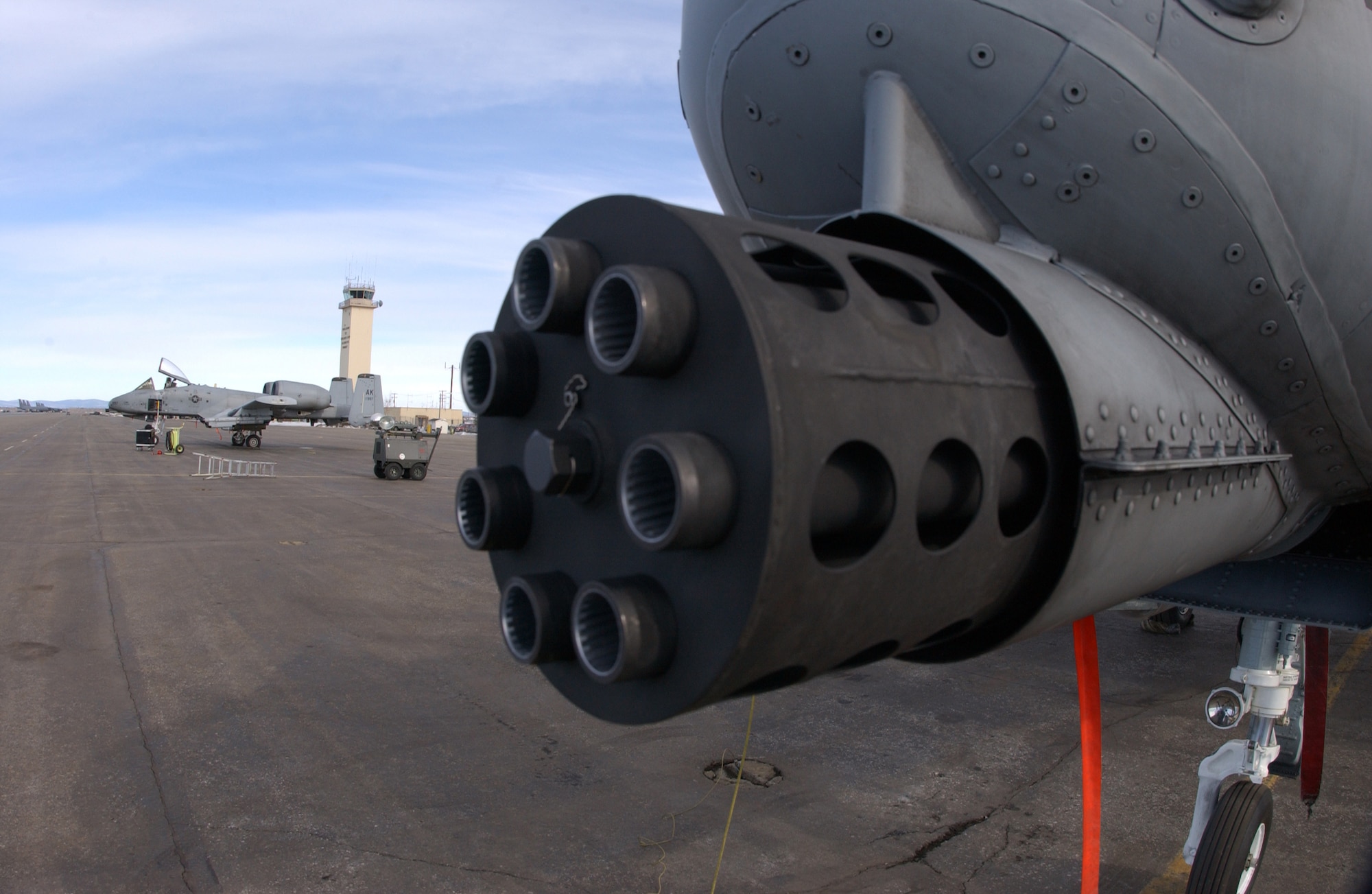 EIELSON AIR FORCE BASE, Alaska -- Two O/A-10 Thunderbolt 2's from the 355th Fighter Squadron, 354th Fighter Wing, Eielson Air Force Base, Alaska sit on the flightline here awaiting training missions on 7 Apr. On the nose of the O/A-10 is a 30mm GAU-8 Avenger seven-barrel Gatling gun which is used to pierce heavy armor. The 355th Fighter Squadron’s primary missions include air strike control, close air support, target interdiction, joint air attack team, combat escort, and combat search and rescue. The squadron also supplies several Army battalions with air liaison officers who deploy, train and operate with their assigned ground force.
(U.S. Air Force Photo by Senior Airman Joshua Strang)