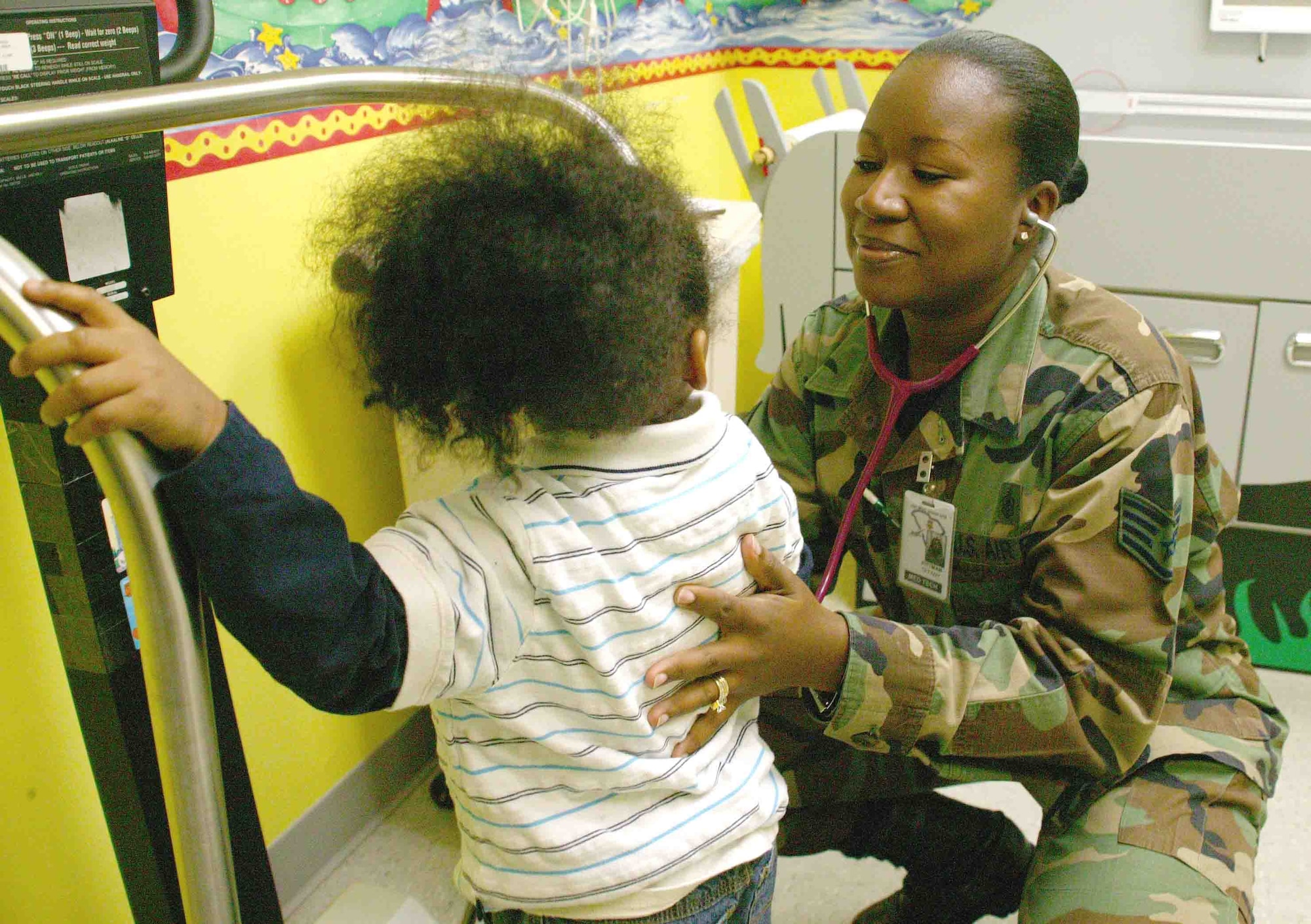 Staff Sgt. Tiffany Pittman, 20th Medical Operations Squadron aerospace medical technician, listens to a patient's heart Nov. 6. (U.S. Air Force photo/Senior Airman John Gordinier)