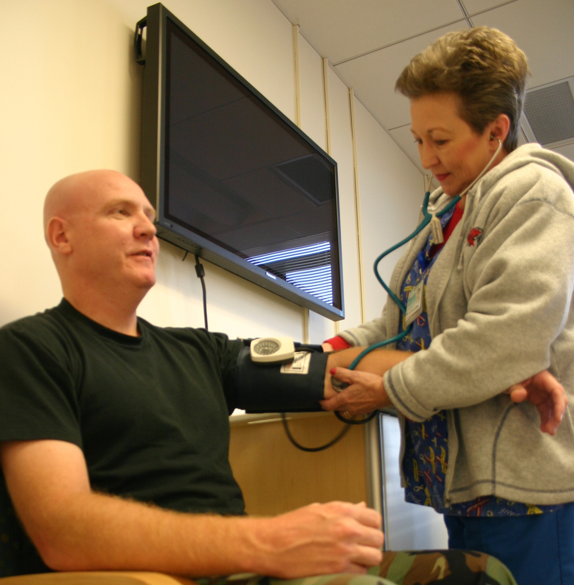 The newly-renovated Family Practice Clinic at the 82nd Medical Group is now open for business following a grand opening Nov. 2. Judy Rinehart, above, a nurse practitioner at the clinic, takes Tech. Sgt. Gene Truman’s blood pressure during a visit Tuesday. (U.S. Air Force photo/Staff Sgt. Tonnette Thompson)