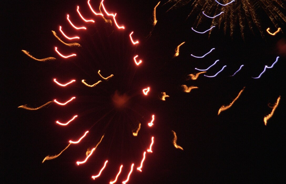 Fireworks explode in the dark Texas sky to celebrate the United States’ 230th birthday. (U.S. Air Force photo/Sandy Wassenmiller).
