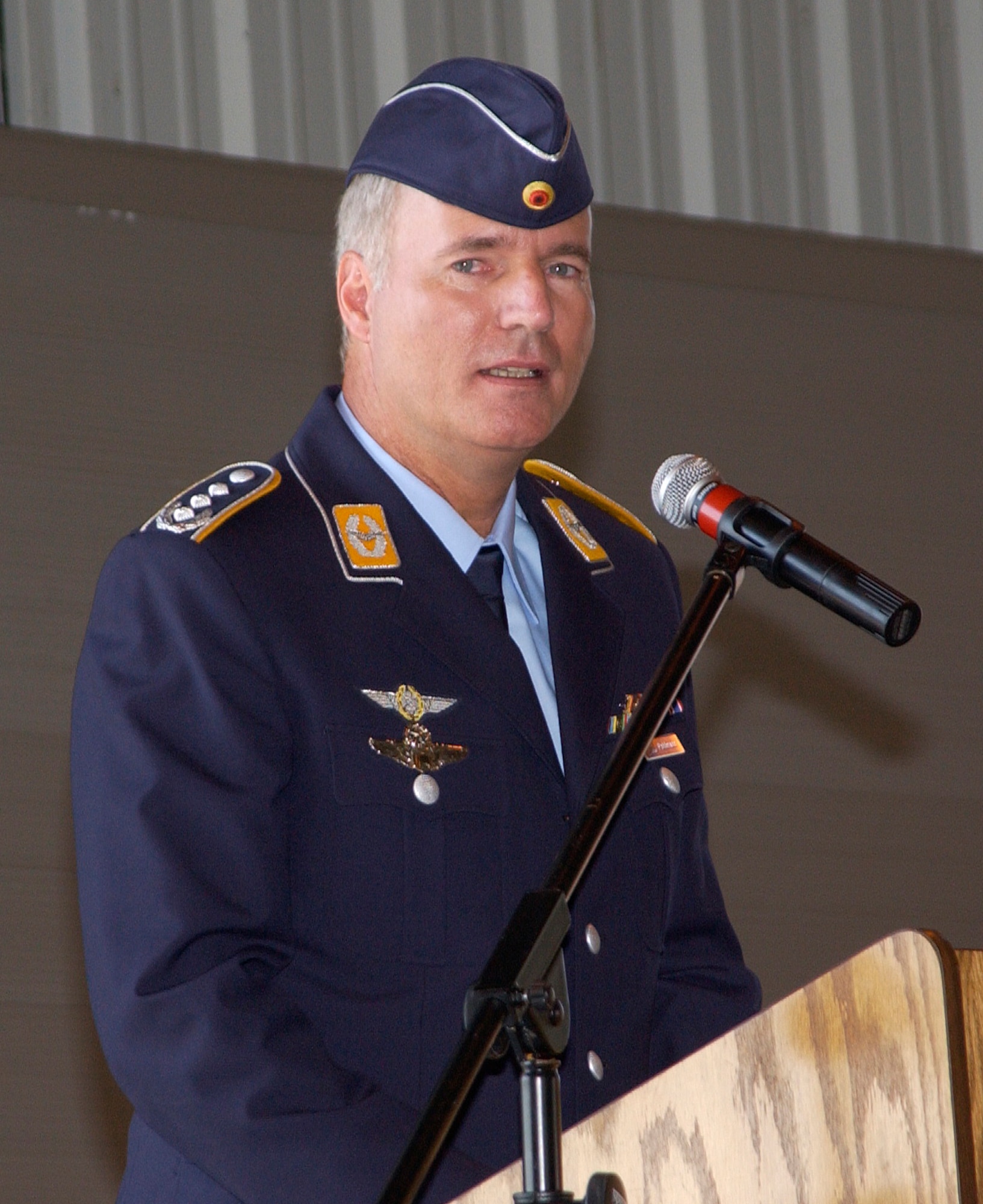German Col. Axel Pohlmann makes a few comments during the 80th Operations Group change of command June 30. Colonel Pohlmann took command from outgoing Col. Heinrich Schneider. (U.S. Air Force photo/Harry Tonemah).