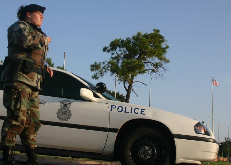 82nd Security Forces Squadron Staff Sgt. Dawn Stevens controls traffic following an "explosion" at teh community center. SFS members set up a perimeter around the site to keep traffic out of the area. (U.S. Air Force photo/John Ingle)