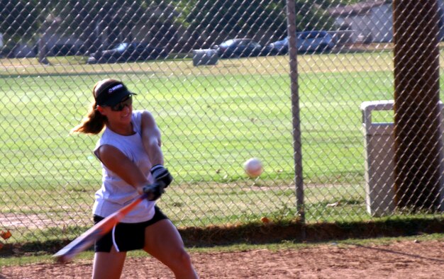 Tina Cooper hits the ball during a Lady Senator practice prior to leaving for tryouts with the U.S. Air Force Women's Softball team at HIll Air Force Base, Utah. Cooper was one of 14 selected to tryout for the team. (U.S. Air Force photo/Airman Jacob Corbin)