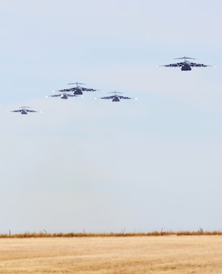 Altus Air Force Base C-17s participated in a 51-ship Mobility Air Forces Exercise Nov. 7.  The exercise represented a strategic brigade airdrop insertion scenario that, when fully executed, would put a brigade-size force of Army troops into enemy territory just days after being directed by senior military leaders.