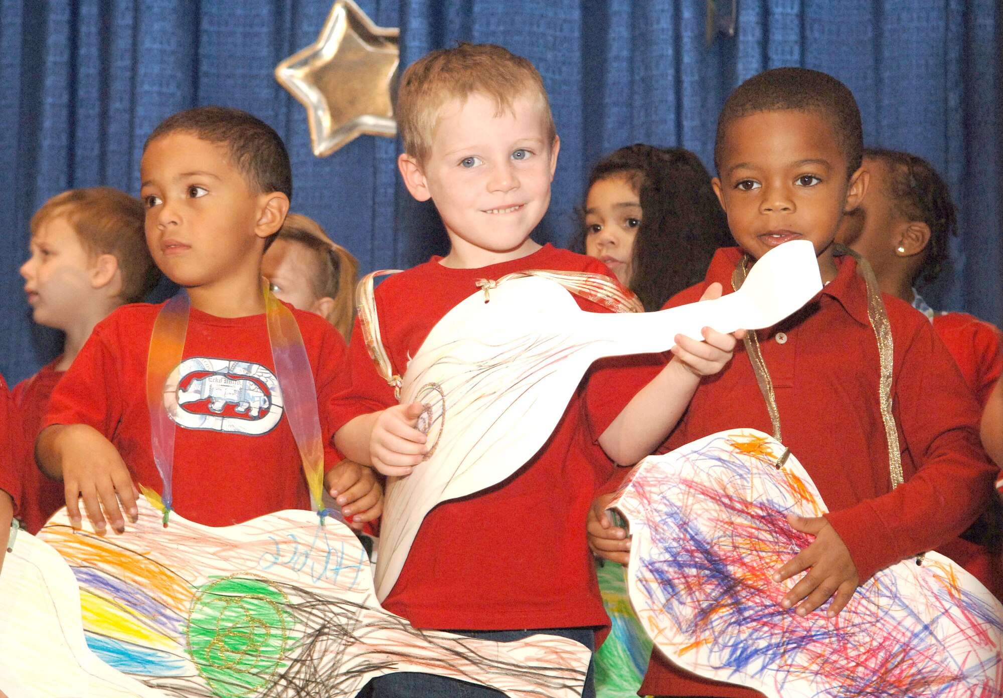 The Pre-kindergarten classes sing the “Three Pigs’ Blues” during Moody’s ninth annual Air Force Family and Teen Talent Show Nov. 3 at the Hoffman Base Theater. The theme was “Stars of Tomorrow.” Videotapes of the eight winning performances are sent to compete with other talent show winners Air Force-wide. More than 100 children participated in the show. (U.S. Air Force by Airman 1st Class Schelli Jones)
