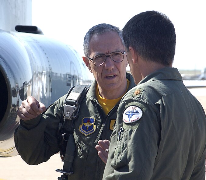 Lt. Gen. Gian Piero Ristori, Italian deputy commander of the School of the Air Force, visits with Maj. Rick Folkening of the 90th Flying Training Squadron May 19 before the general’s flight in a T-38C Talon. (U.S. Air Force photo/Mike Litekken).