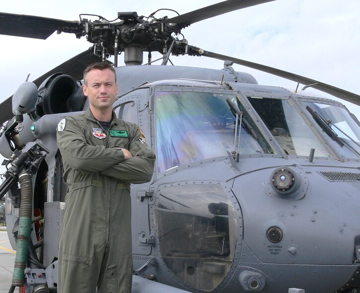 Capt. Eric Trocinski, 41st Rescue Squadron pilot, stands beside an HH-60G Pave Hawk shortly before takeoff from Moody’s flightline. Capt. Trocinski was recently awarded the Air Rescue Association’s 2006 Richard T. Kight award for his performance in the deployed environment. (U.S. Air Force photo by Airman 1st Class Eric Schloeffel)