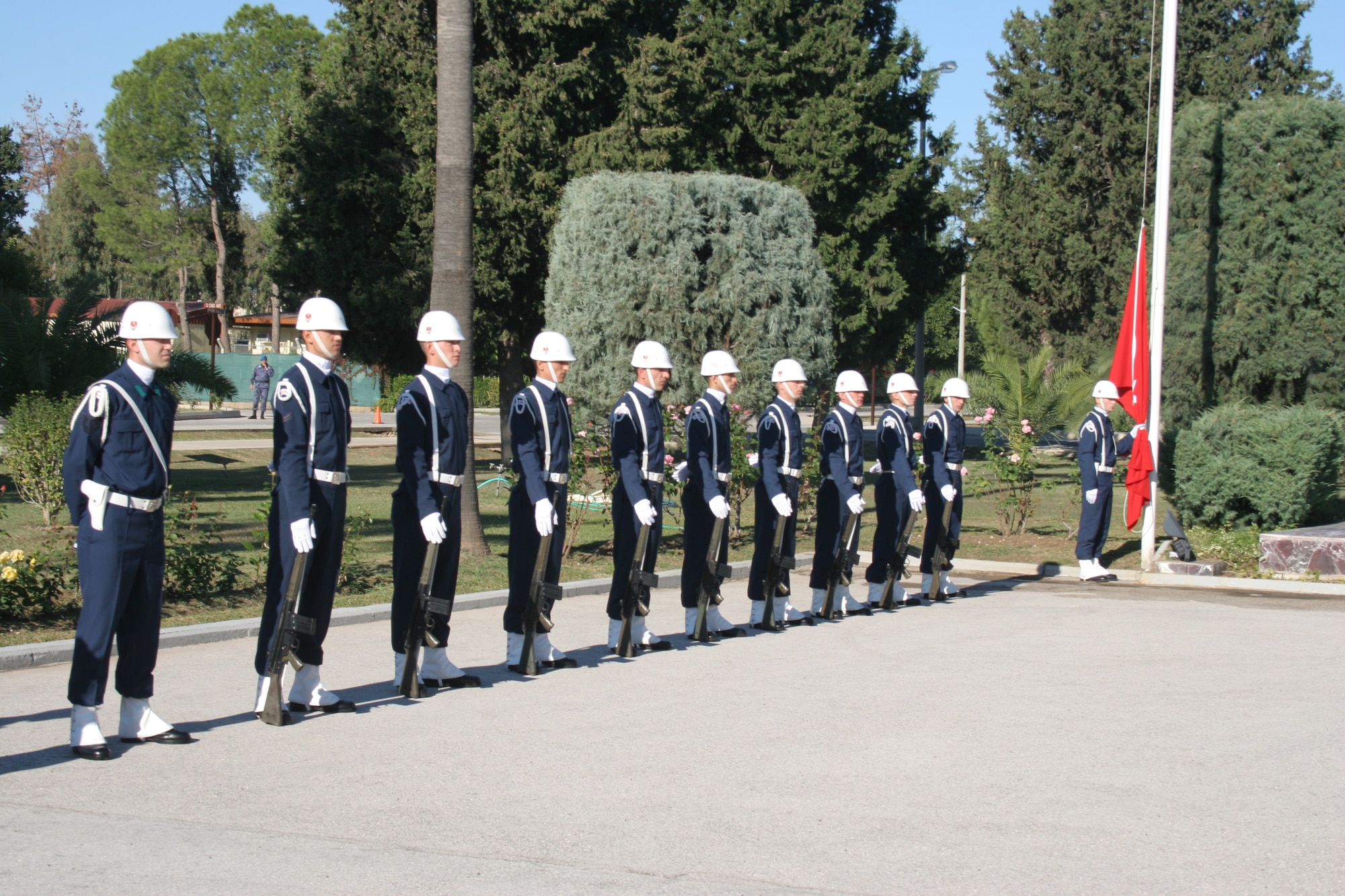 INCIRLIK AIR BASE, Turkey -- Members of the 10th Tanker Air Force honor guard prepare to rasise the Turkish flag to half mass to commemorate Mustafa Kemal Ataturk's memorial Nov. 10, in front of the 10th Tanker headquarters building.  This year marks the 68th anniversary of Ataturk's death.  Ataturk, the founder and first president of the modern Republic of Turkey, set up schools, separated religious affairs from state affairs and granted women equal rights as men. (U.S. Air Force photo by Senior Airman Patrice Clarke)
