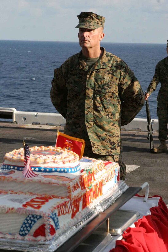 Sgt. Maj. Andy Crout stands at parade rest while waiting for the 24th Marine Expeditionary Unit's 231st Marine Corps Birthday cake cutting ceremony to begin Nov. 10.::n::Crout, the 24th MEU sergeant major, was the oldest Marine present for the ceremony and is a native of Garden Grove, Calif.