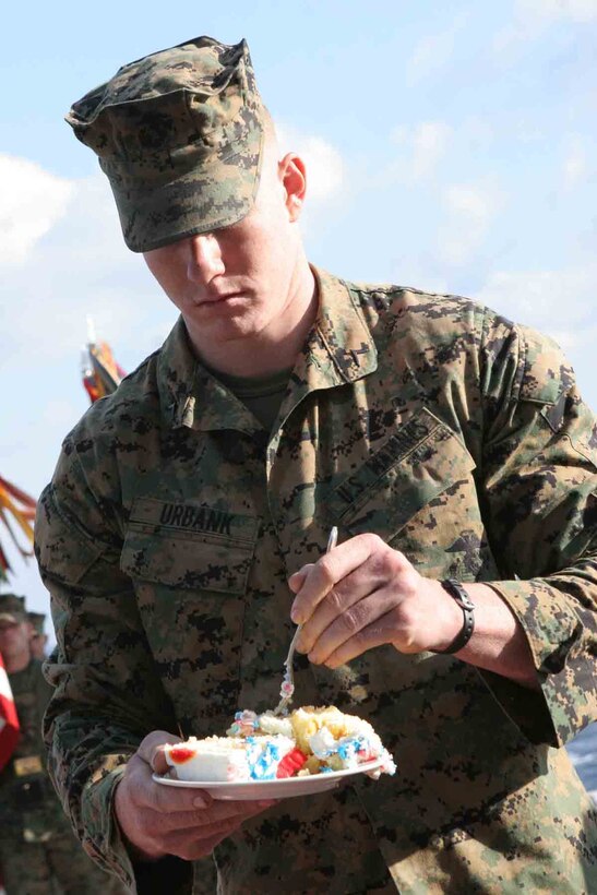 Private First Class Vincent Urbank, 21, takes a bite of cake during the 24th Marine Expeditionary Unit's 231st MArine Corps Birthday cake cutting ceremony aboard the USS Iwo Jima Nov. 10.::n::Urbank, a native of Point Place, N.J., was the youngest Marine present for the ceremony.  The 24th MEU is returning home after a six-month deployment with the Iwo Jima Expeditionary Strike Group. (U.S. Marine Corps photo by Lance Corporal Joshua Lujan)::n::