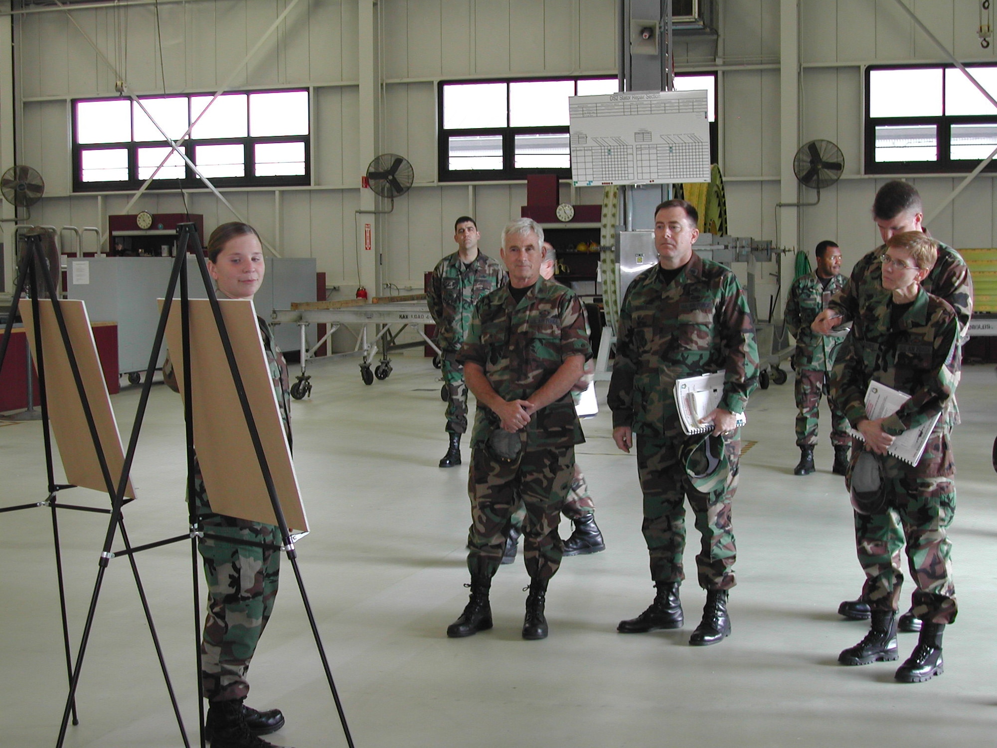 Airman 1st Class Heather Hammond, 436th Maintenance Squadron, briefs Daedalian award team members about a Jet Engine Intermediate Lean Event here recently. Lean is a tool to streamline work processes and save money. It's one of many reasons that Dover Air Force Base recently won the Clemens McMullen Memorial Daedalian Weapon System Maintenance Trophy for Air Mobility Command. Dover hasn't won the presitigous award since the base claimed back-to-back titles in 1993 and 1994. Dover Air Force Base will now go on to compete against other installations at the Air Force level. The base hasn’t won at the Air Force level since 1975. (U.S. Air Force photo/Staff Sgt. John Respoli)