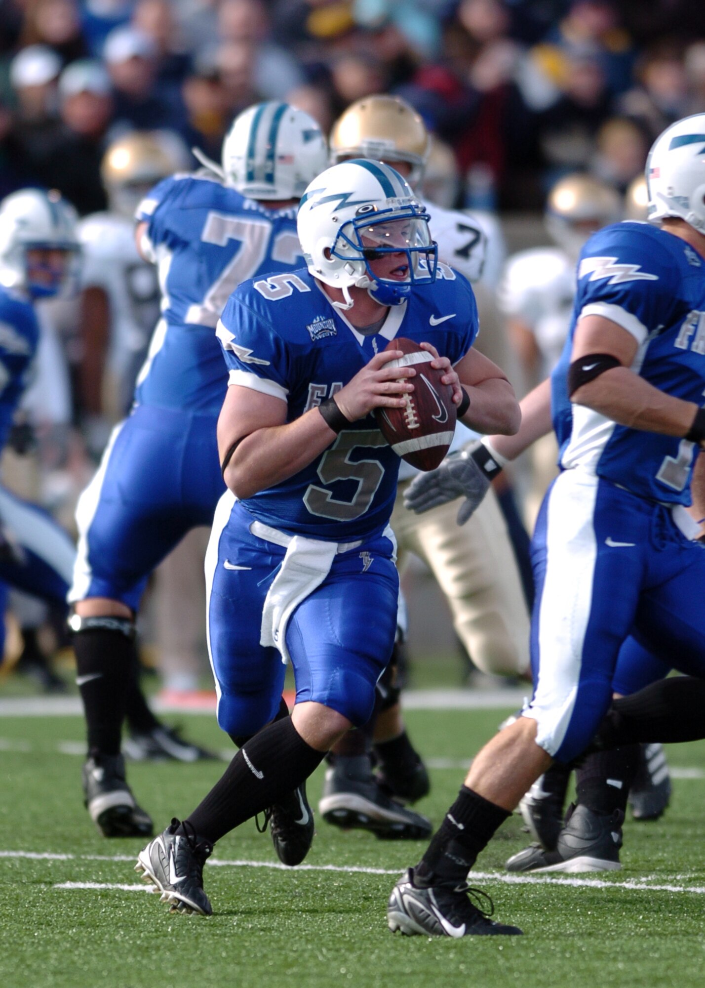 Air Force quarterback Shaun Carney looks for targets downfield against 8th-ranked Notre Dame Saturday. Carney threw for 205 yards and two touchdowns on the day, but was outmatched by Irish quarterback Brady Quinn?s four touchdowns. The Irish cruised to victory, 39-17.  (U.S. Air Force photo/1st Lt. John Ross)