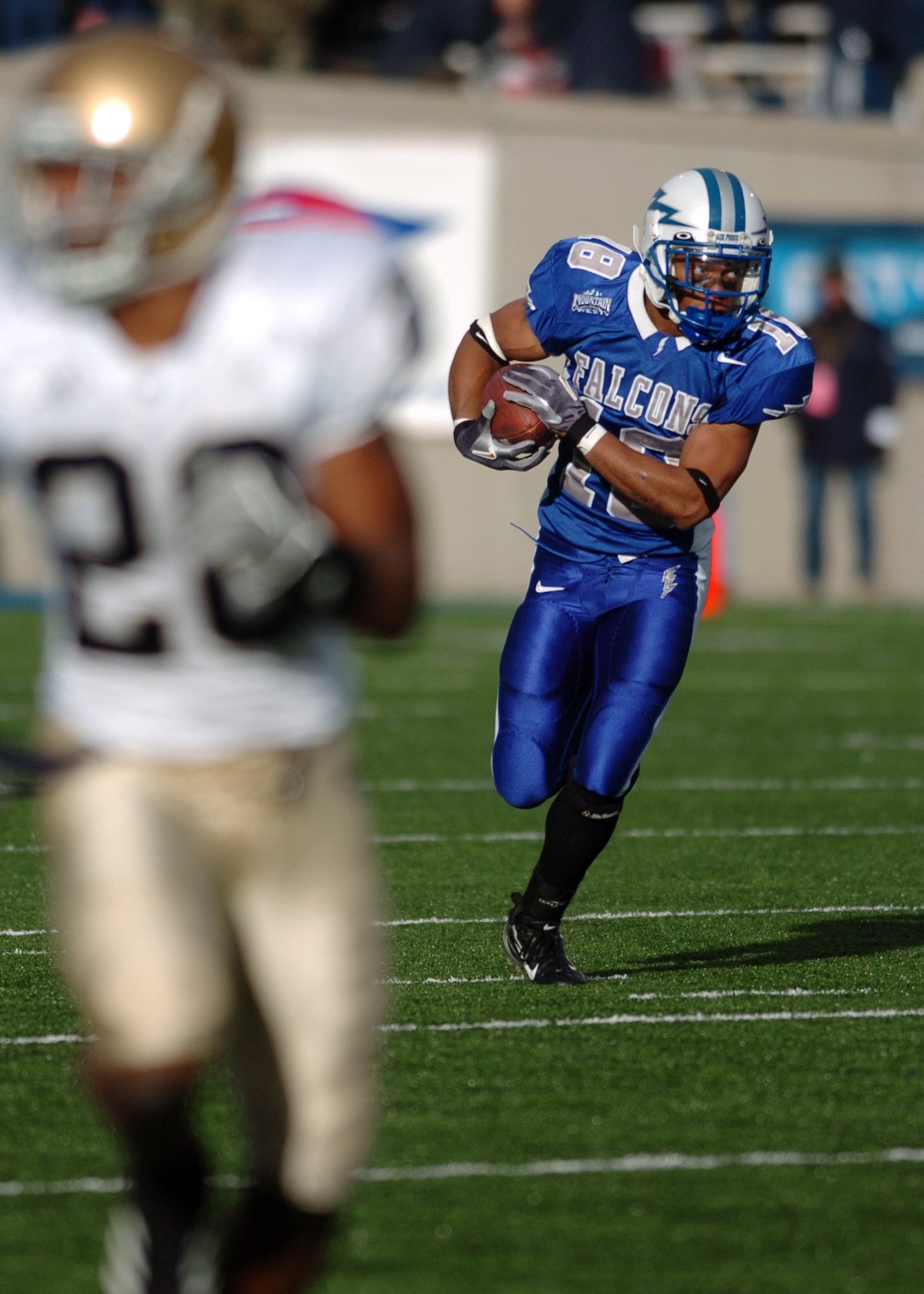 Air Force halfback Justin Handley looks for room upfield on a short second-quarter gain. Ten Falcons carried the ball for 200 total yards, but Irish quarterback Brady Quinn?s four passing touchdowns were too much for Air Force. Eighth-ranked Notre Dame won, 39-17.  (U.S. Air Force photo/1st Lt. John Ross)