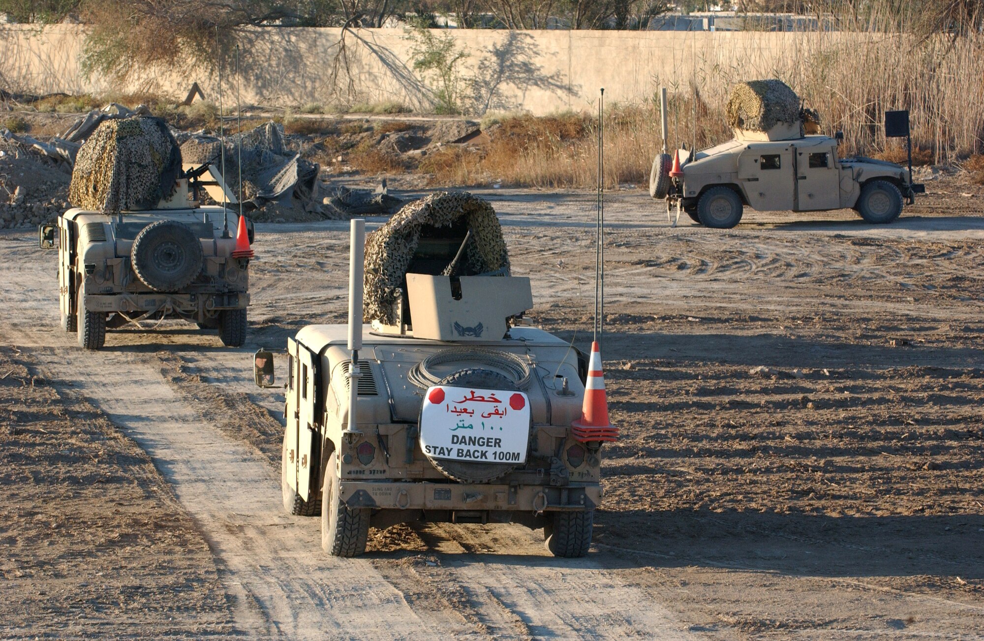 First squad, Bravo Flight, Detachment 7, 732nd Expeditionary Security Forces Squadron conduct rehearsals prior to a patrol of Baghdad, Iraq. The detachment's mission is to deploy into the city to assist Iraqi police in achieving self-sufficiency and enable orderly control of their battle space. (U.S. Air Force photo/Master Sgt. Steve Cline)
