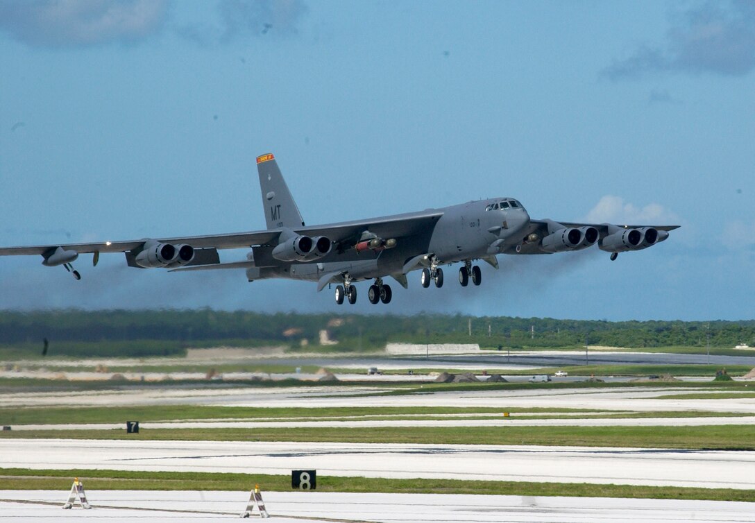 A B-52 Stratofortress takes off from Andersen Air Force Base, Guam, Nov. 3 armed with four Mk 56 mines. This sortie was the 10th and final mission of a week-long joint sea mine-laying exercise with the Navy. The B-52s dropped a total of 96 inert mines on two practice mine fields that were each three miles long and a mile wide. (U.S. Air Force photo/Staff Sgt. Eric Petosky)