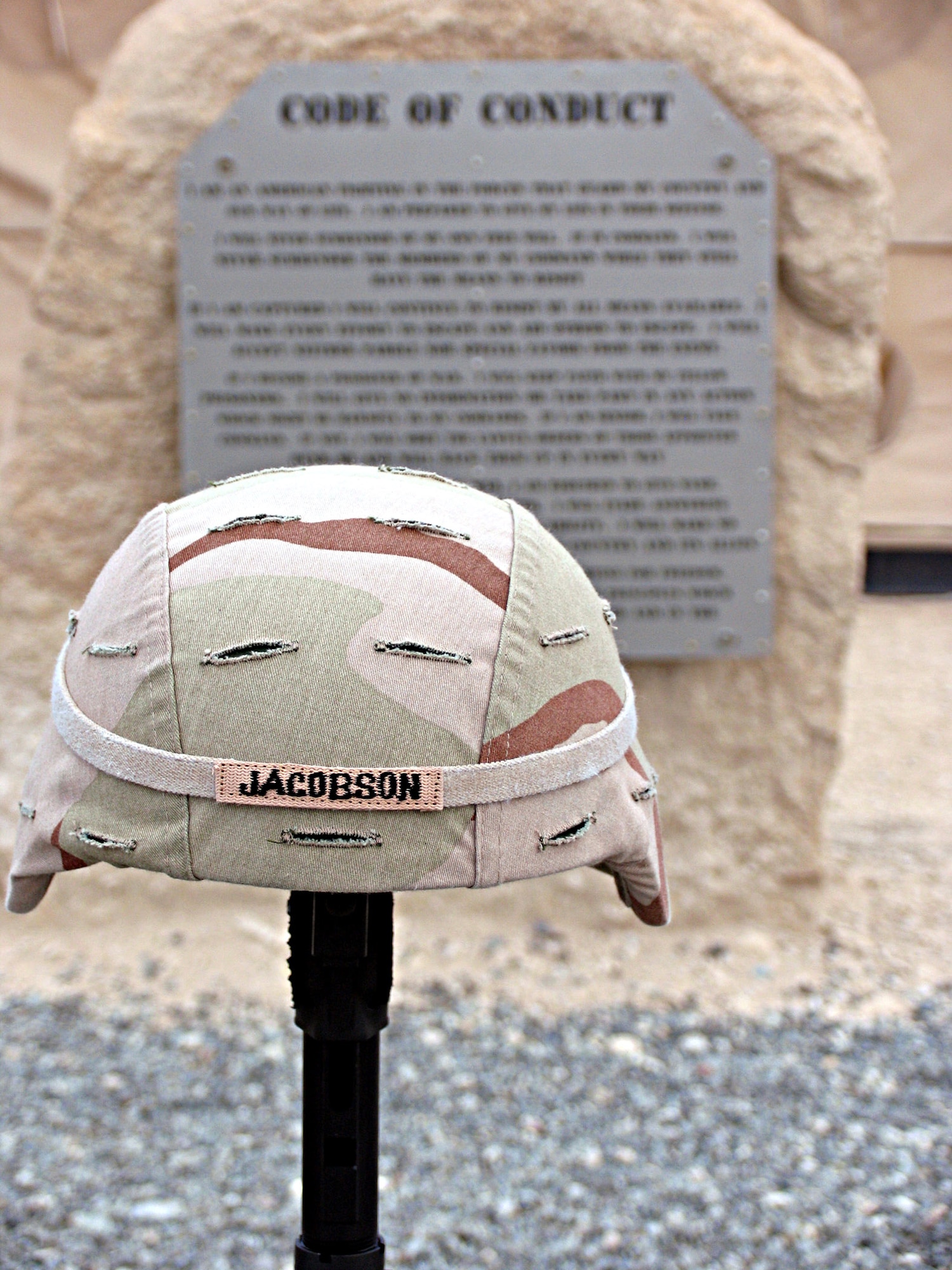 This display was built by members of the 386th Expeditionary Security Forces Squadron for a remembrance ceremony to honor veterans, including Airman 1st Class Elizabeth Jacobson, who was killed while on a convoy near Camp Bucca, Iraq.  Her vehicle was hit by an improvised explosive device on Sept. 28, 2005. She was the first female Airman killed in the line of duty supporting Operation Iraqi Freedom. (U.S. Air Force photo/Capt. Jeff Clark)
