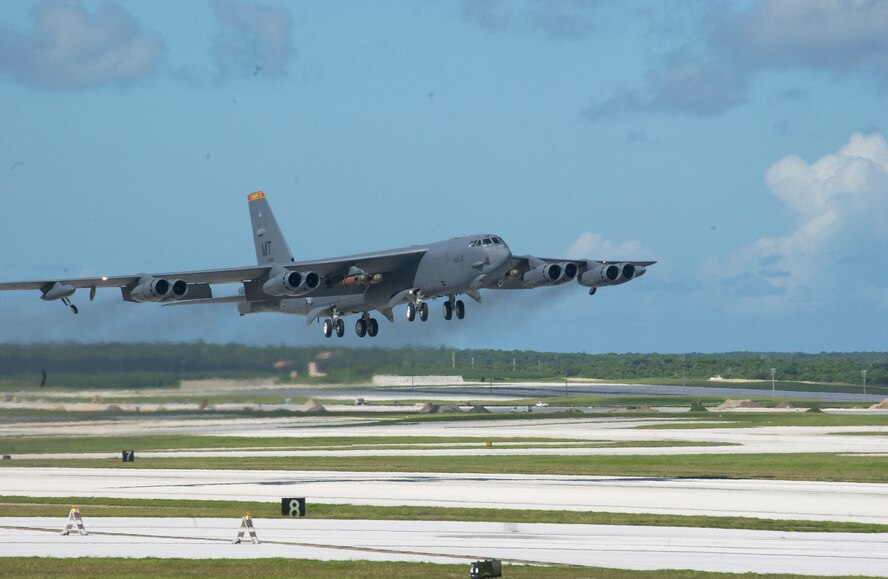 ANDERSEN AIR FORCE BASE, Guam – A B-52 Stratofortress takes off from here armed with four Mk 56 mines Nov 3. This sortie was the 10th and final mission of a week-long joint sea mine laying exercise with the Navy.  The B-52s dropped a total of 98 inert mines on two practice mine fields that were 3-miles long, and a mile wide. (U.S. Air Force photo by Staff Sgt. Eric Petosky)                               
