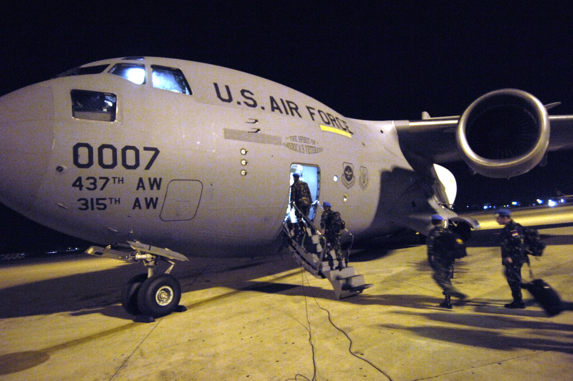 Indonesian peacekeeping troops board a C-17 Globemaster III Nov. 8 for deployment to Lebanon in support of UNIFIL, the United Nation's Interim Force in Lebanon.  (U.S. Air Force photo/Tech. Sgt. John M. Foster)