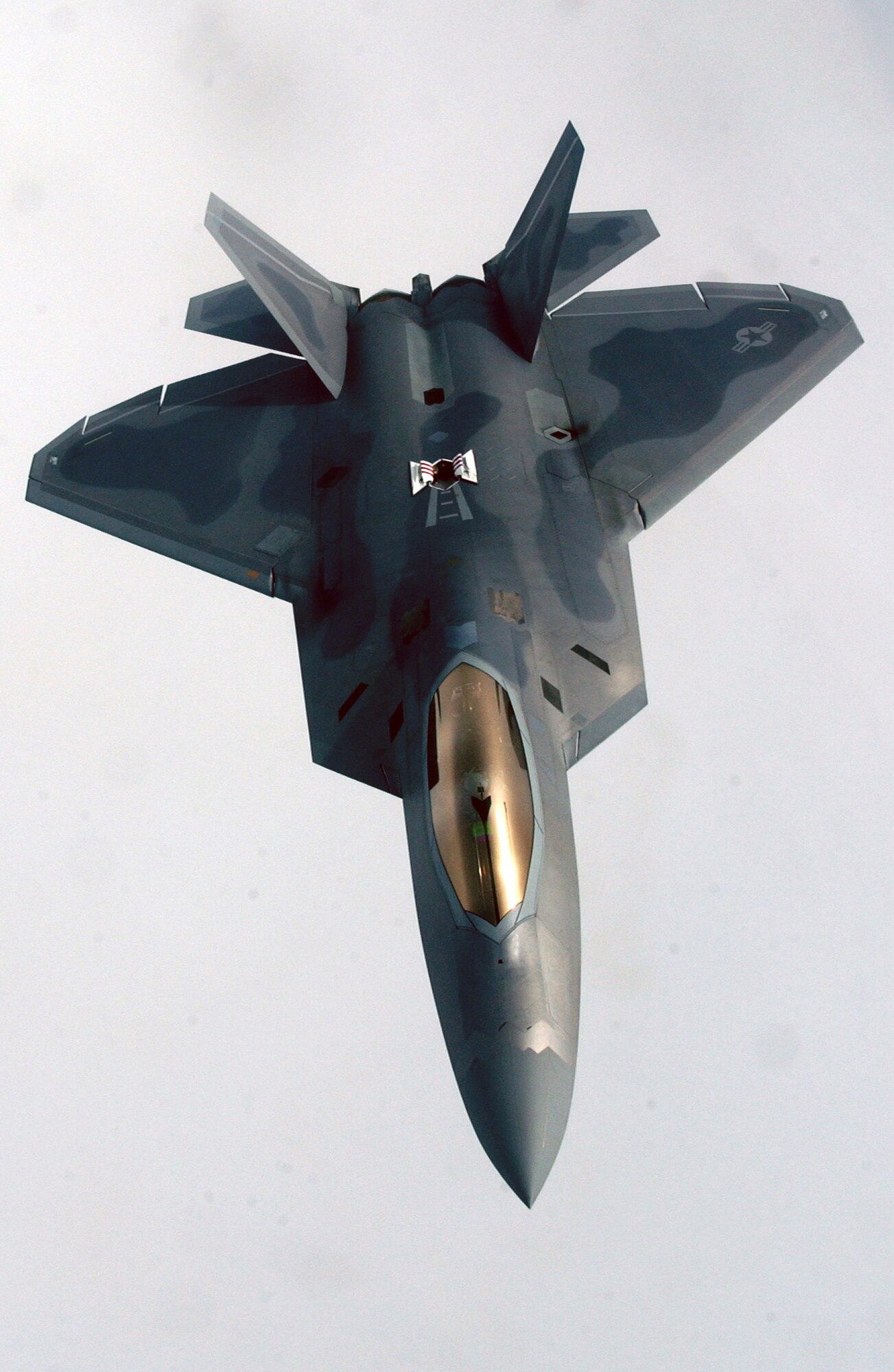 OVER ALASKA -- An F-22A Raptor from the 27th Fighter Squadron, Langley Air Force Base, Virginia pulls away from a KC-135R Stratotanker from the 168th Air Refueling Wing, Alaska Air National Guard, on 9 June during exercise Northern Edge. Northern Edge 2006 is a joint training exercise hosted by Alaskan Command and is one of a series of U.S. Pacific Command exercises that prepare joint forces to respond to crises in the Asian Pacific region.
(U.S. Air Force Photo by Staff Sgt Joshua Strang)