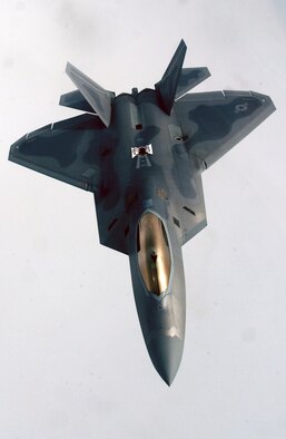 An F-22 Raptor from the 27th Fighter Squadron, Langley Air Force Base, Virginia pulls away from a 168th Air Refueling Wing KC-135R Stratotanker during Exercise Northern Edge June 9, 2006. Northern Edge is a joint training exercise hosted by Alaskan Command and is one of a series of U.S. Pacific Command exercises that prepare joint forces to respond to crises in the Asian Pacific region. (U.S. Air Force Photo by Staff Sgt Joshua Strang) 