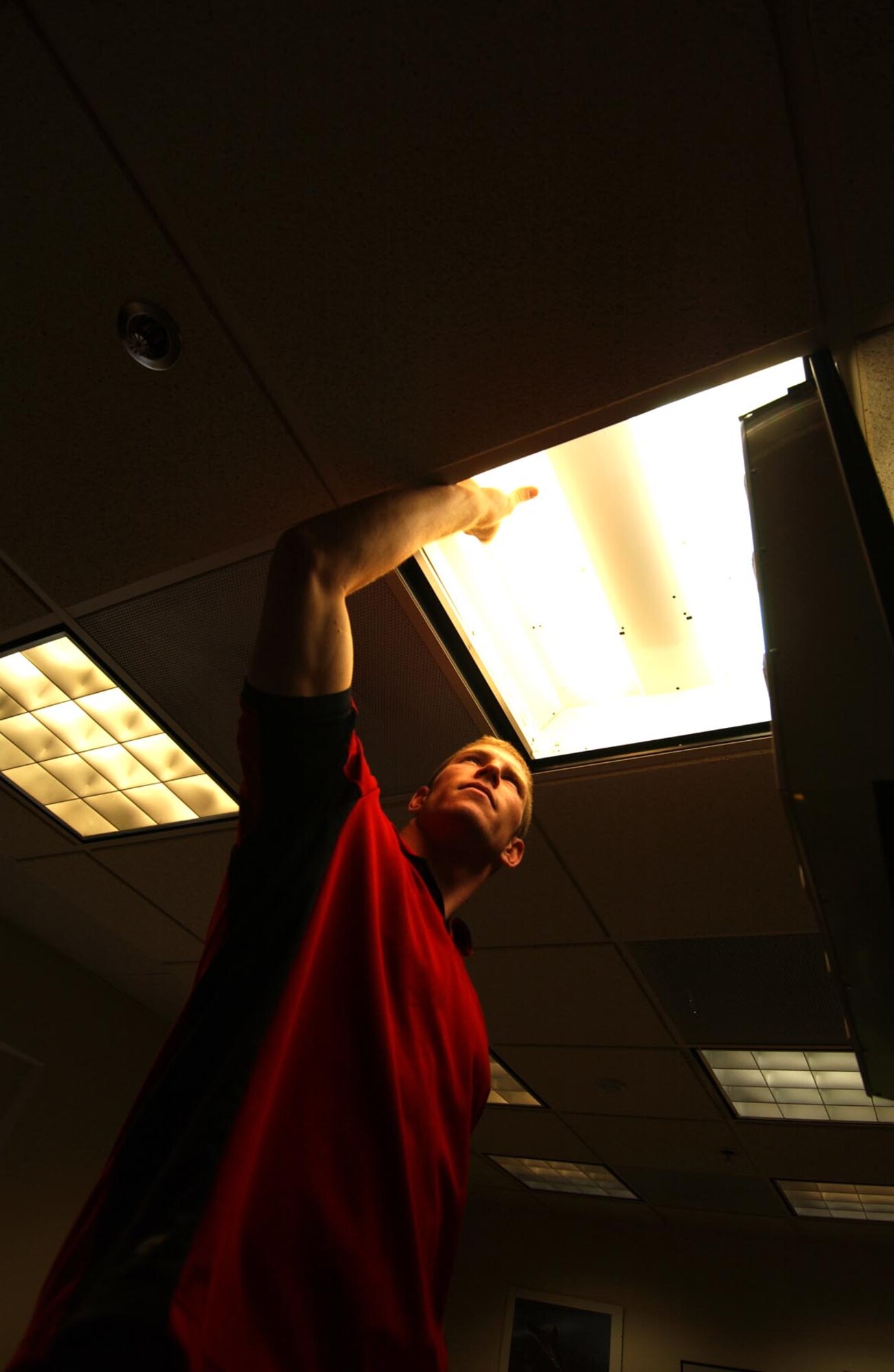 Dan Kontz replaces lightbulbs in the 931st Air Refueling Group Headquarters building. Kontz performs building and grounds maintenance for the 931st ARG. Kontz has been with the 931st ARG since Sept. 2004 and has been a civilian employee on McConnell, Air Force Base , Kan. since the summer of 2003. Dan’s father, Lt. Col. Keith Kontz, is the 931st ARG Chief of Standardization and Evaluation. 