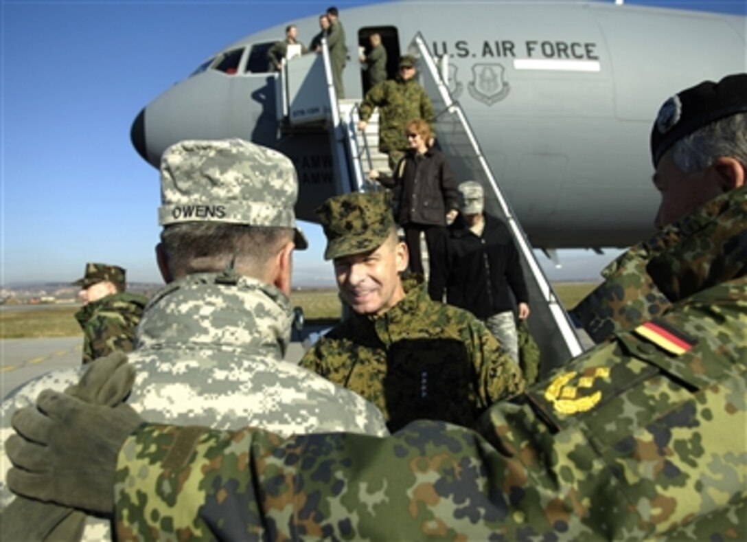 Chairman of the Joint Chiefs of Staff U.S. Marine Gen. Peter Pace arrives at Kosovo and is introduced to Brig Gen. Darren Owens, Nov. 14, 2006.