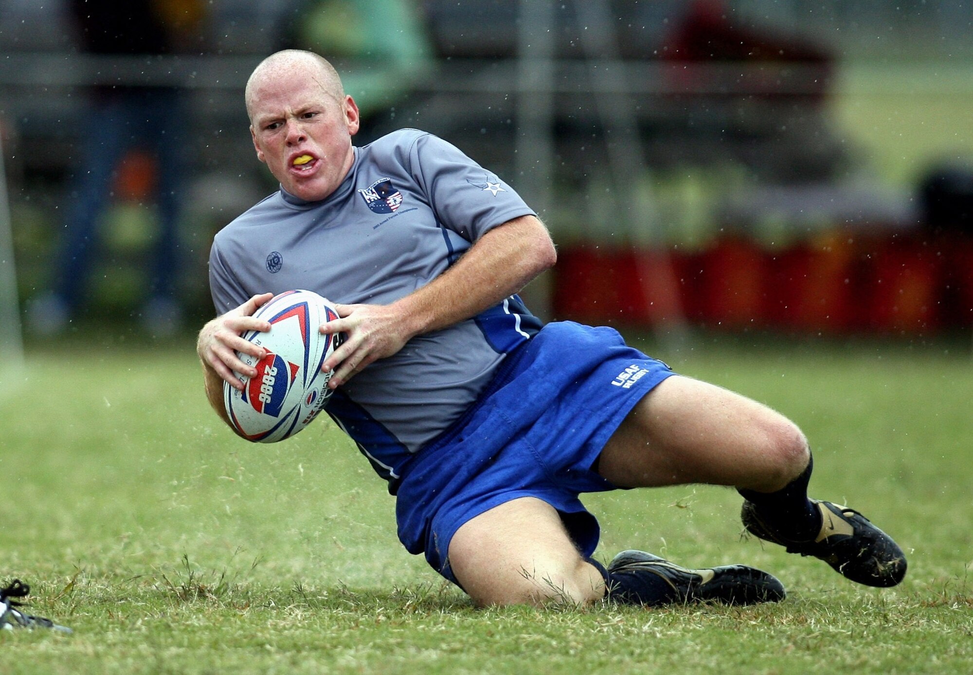 Senior Airman James Hubby scores against the Marine Corps during the final Armed Forces Rugby Championship match Oct. 27 at Camp Lejeune, N.C.  Air Force beat the Marines 38-3 to win their third straight Armed Forces championship.  (U.S. Air Force photo/Major Scott Foley)