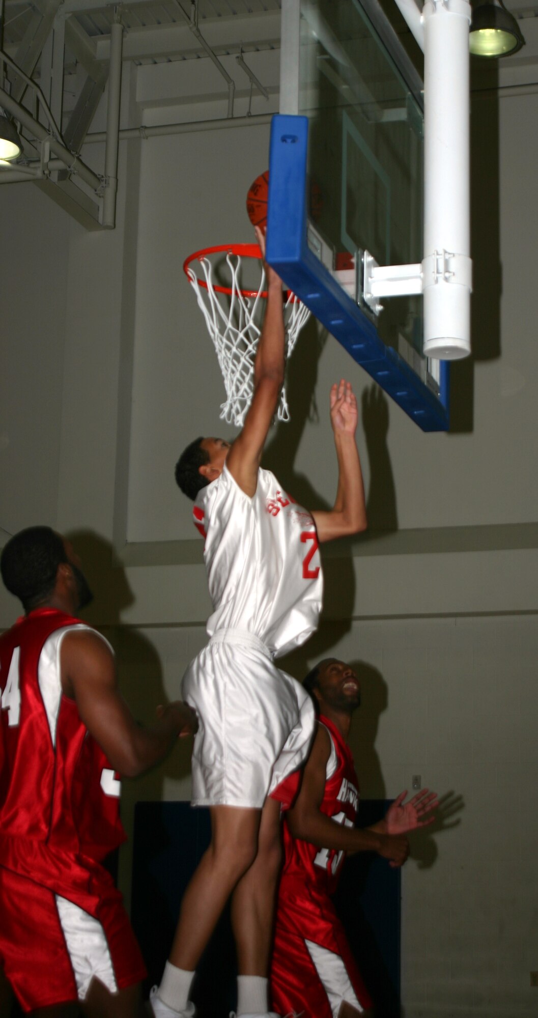 Gale Passé, a member of  the Sheppard Senators mens varsity basketball team, pushes the ball in for a lay up Sunday at the Pitsenbarger Fitness Center. The Senators took on Goodfellow Air Force Base’s Hawks and won, 83-62. (U.S. Air Force photo/Airman Jacob Corbin).