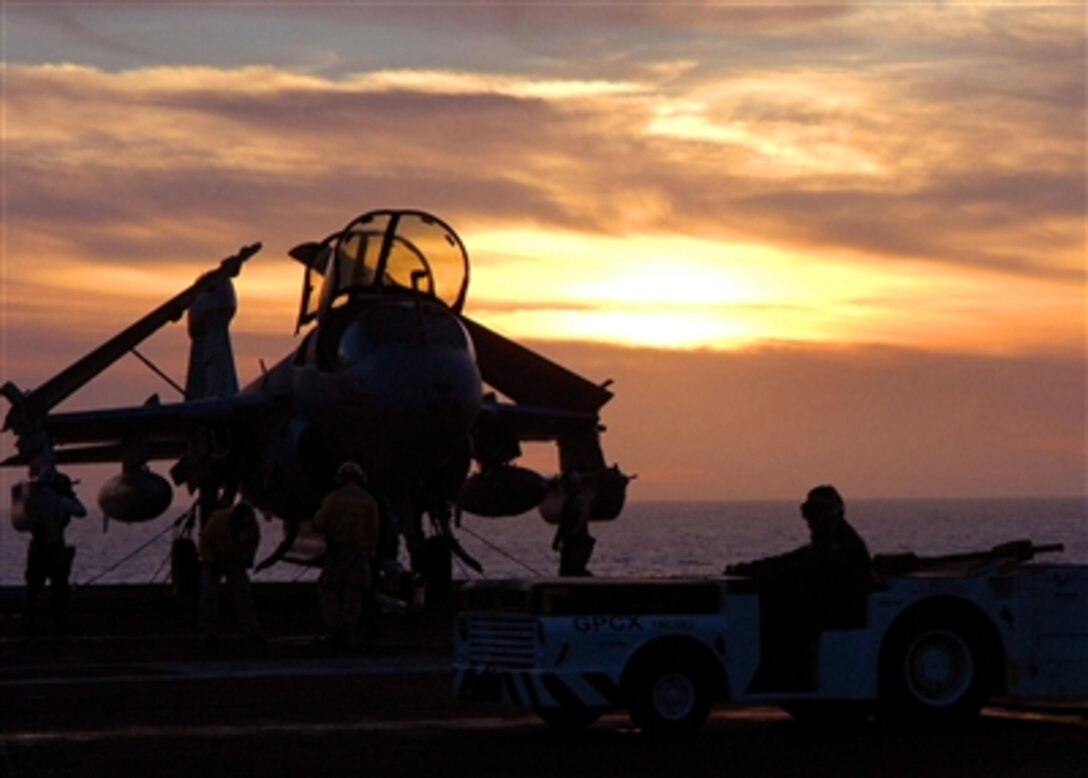 Sailors aboard the nuclear-powered aircraft carrier USS John C. Stennis finish parking aircraft on the flight deck after a long day of flight operations in the Pacific Ocean, Nov. 10, 2006. 