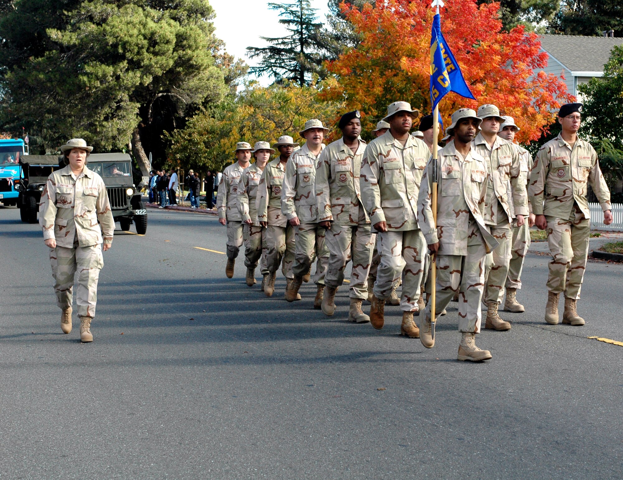 Master Sgt. Diane Payton, (left), 60th Surgical Operations Squadron, leads her troops down the road during the City of Fairfield’s sixth annual Veterans Day Parade Nov. 11. Women led all four of the Travis’ formations. (U.S. Air Force photo by Staff Sgt. Candy Knight/ 60th Air Mobility Wing Public Affairs)