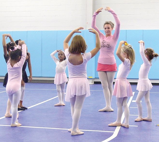 Chanel Muse teaches a group of children the basics of being a ballerina recently at the Youth Center. Several classes are offered at the Youth Center to teach children of all ages different dance styles.