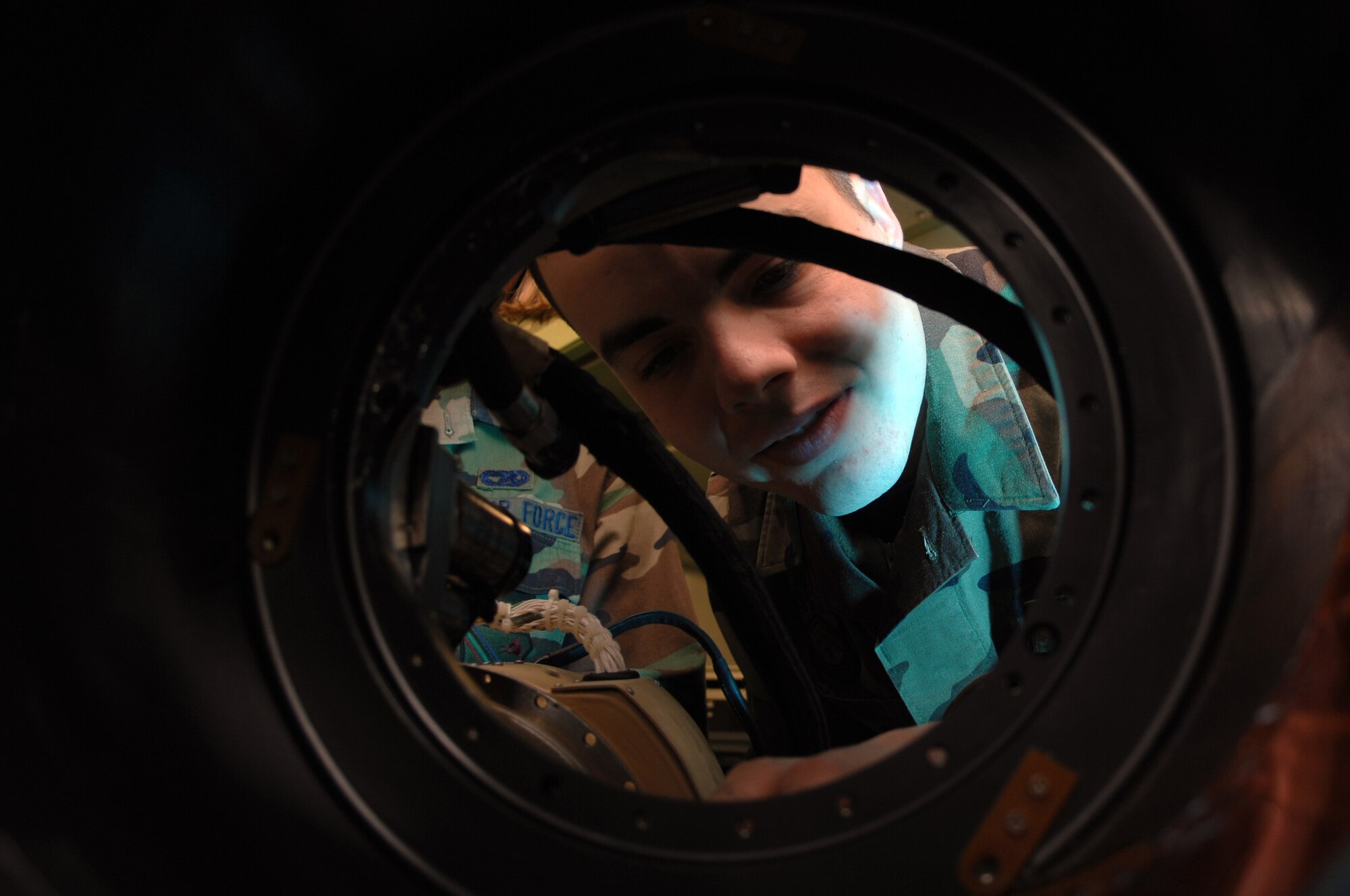 Airman First Class Matthew Orr installs a slip ring onto an F-16 targeting pod Nov. 15 at Eielson Air Force Base, Alaska. Airmen Orr works in the 354th Maintenance Squadron at Eielson AFB. (U.S. Air Force photo/Staff Sgt. Joshua Strang)