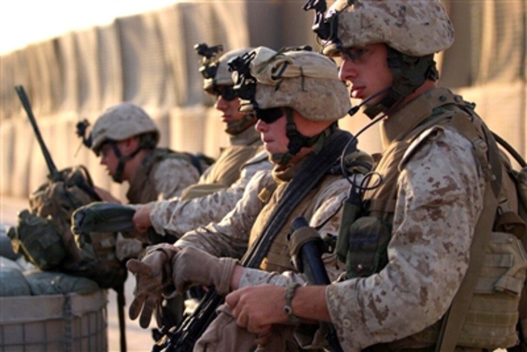 U.S. Marines from 3rd Battalion, 4th Marine Regiment prepare to conduct a patrol in Husaybah, Iraq, Nov. 3, 2006. 