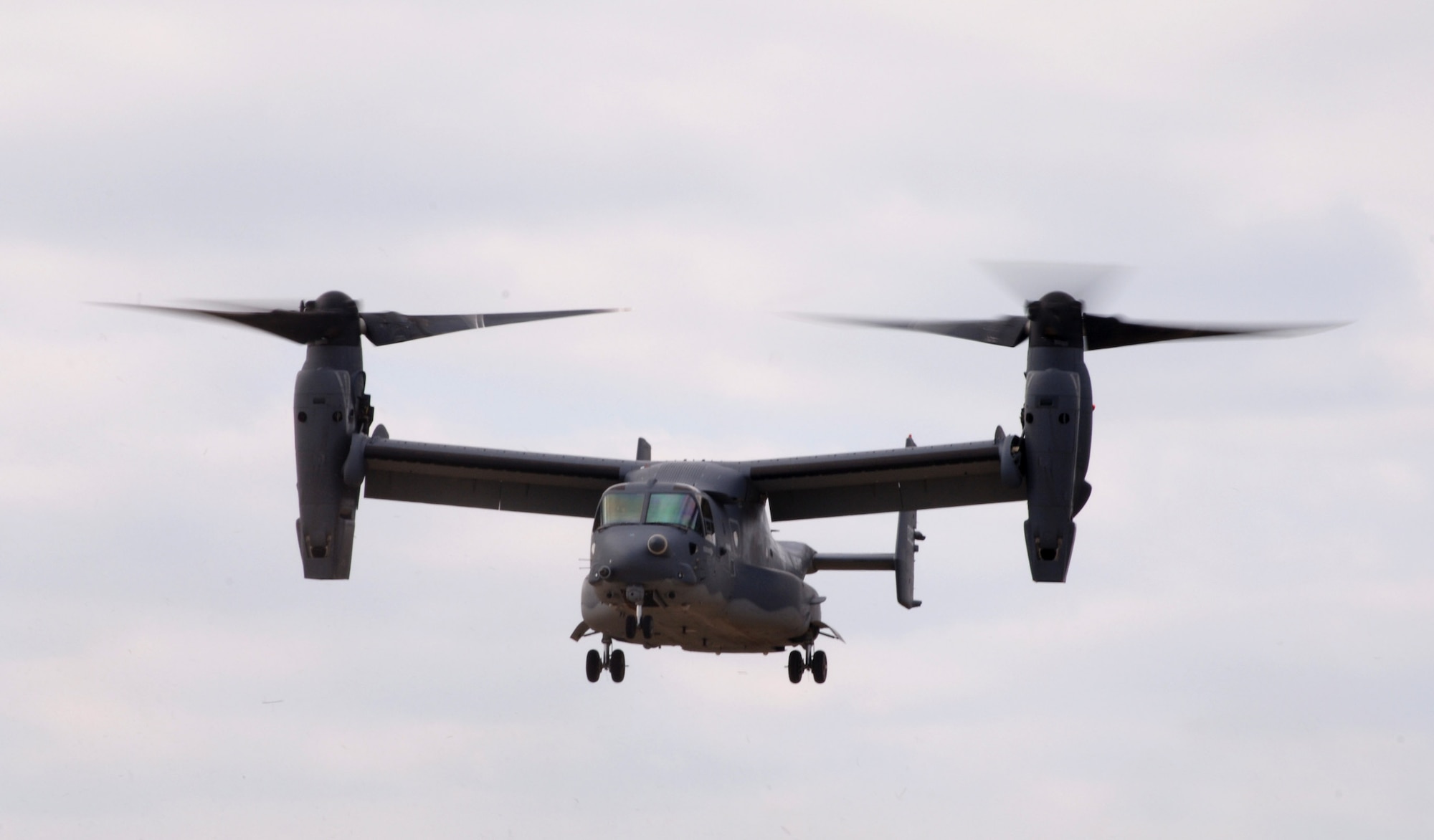 The CV-22 Osprey flies by during its unveiling ceremony at Hurlburt Field, Fla. on Nov 16.  The arrival of the CV-22 to Air Force Special Operations Command is part of Hurlburt Field's Heritage to Horizon commemoration, reflecting on the heritage of air commandos, reaffirming the commitment to the war on terrorism and resolving to continually expand capabilities. The commemoration also includes marking the re-designation of the 16th Special Operations Wing to the 1st SOW and the Air Force's 60th birthday.  (U.S. Air Force photo/Airman First Class Stephanie Sinclair